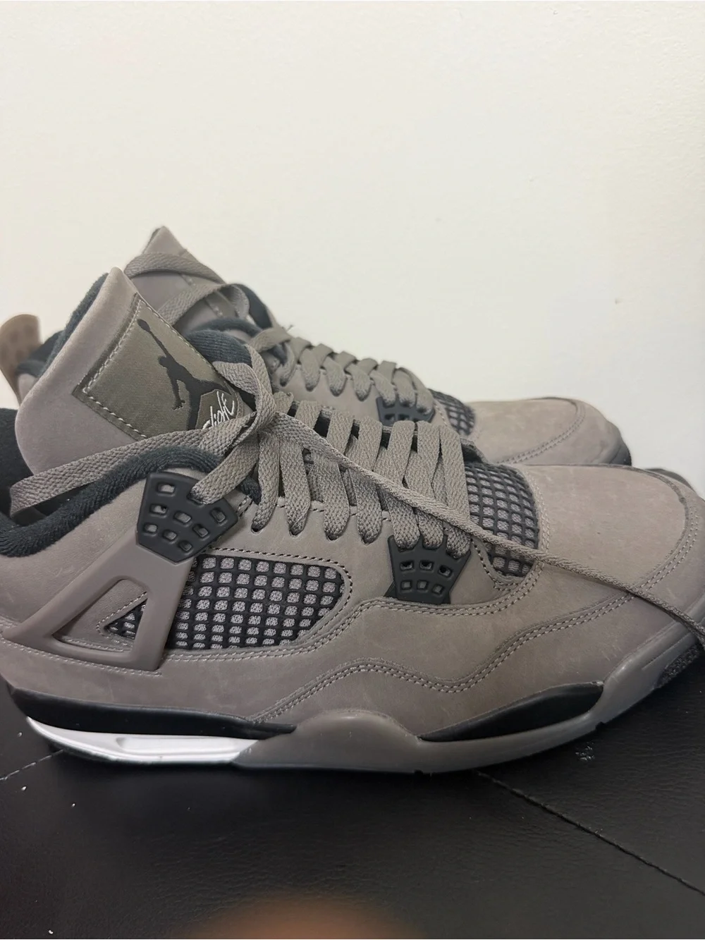 Jordan Retro 4 Sneakers in Grey and Black